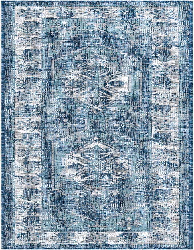 A 6 ft runner rug in shades of blue and white, featuring a distressed Southwestern and traditional pattern, suitable for indoor or outdoor use.