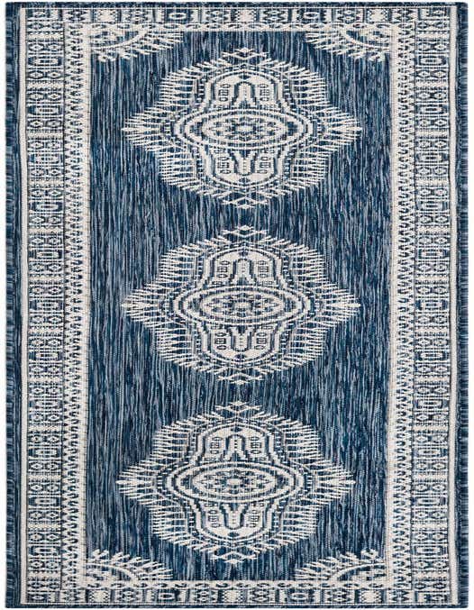 A long 8 ft runner rug in shades of blue and white, featuring a traditional medallion pattern with a textured flatweave.