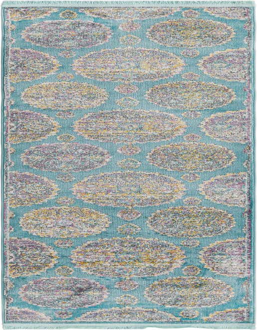 A long 8 ft runner rug in shades of blue with a distressed bohemian floral pattern in purple, yellow, and white.