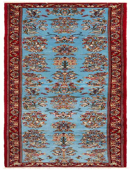 A handmade 13 ft runner rug in light blue with a detailed Persian floral and bird pattern, framed by a rich red border.