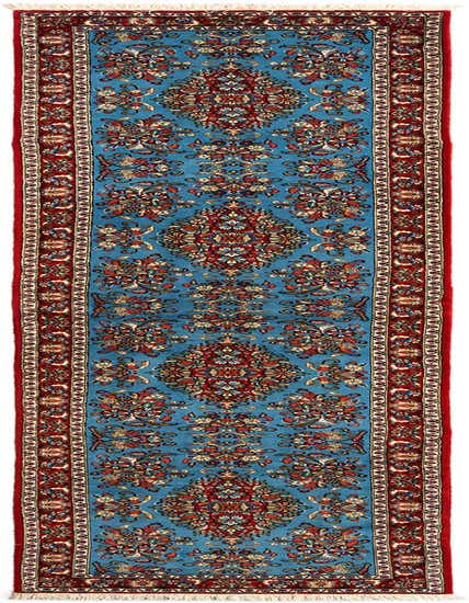 A long 13 ft runner rug with a vibrant blue field and intricate red, gold, and cream Persian floral patterns, ideal for a hallway.
