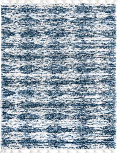 A 12 Ft Serenity Shag runner rug in varying shades of blue and white, featuring a modern trellis pattern and white tassels.