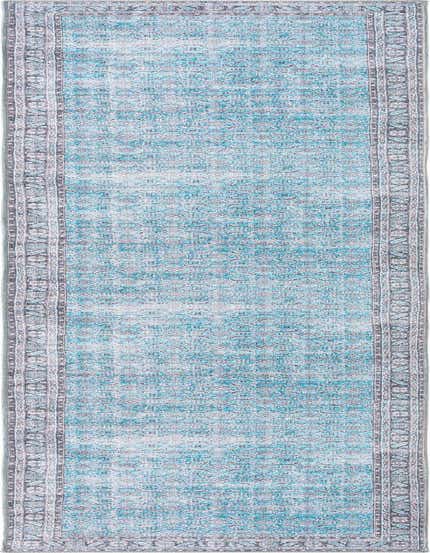 A 12 ft runner rug in shades of blue with a distressed traditional pattern and a decorative border, ideal for a hallway.