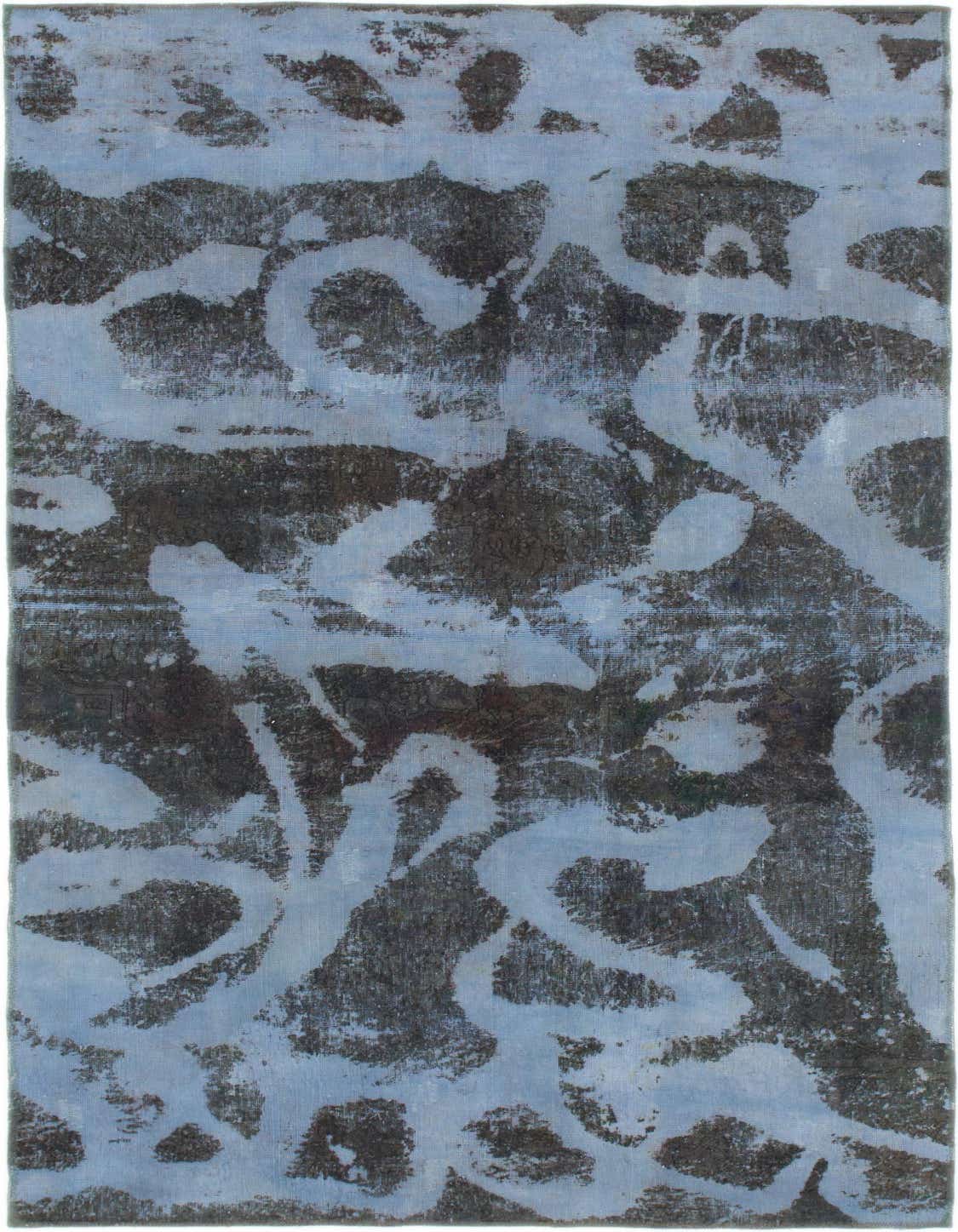 A 10 ft runner rug in shades of blue with an abstract, distressed Persian pattern, perfect for a hallway.