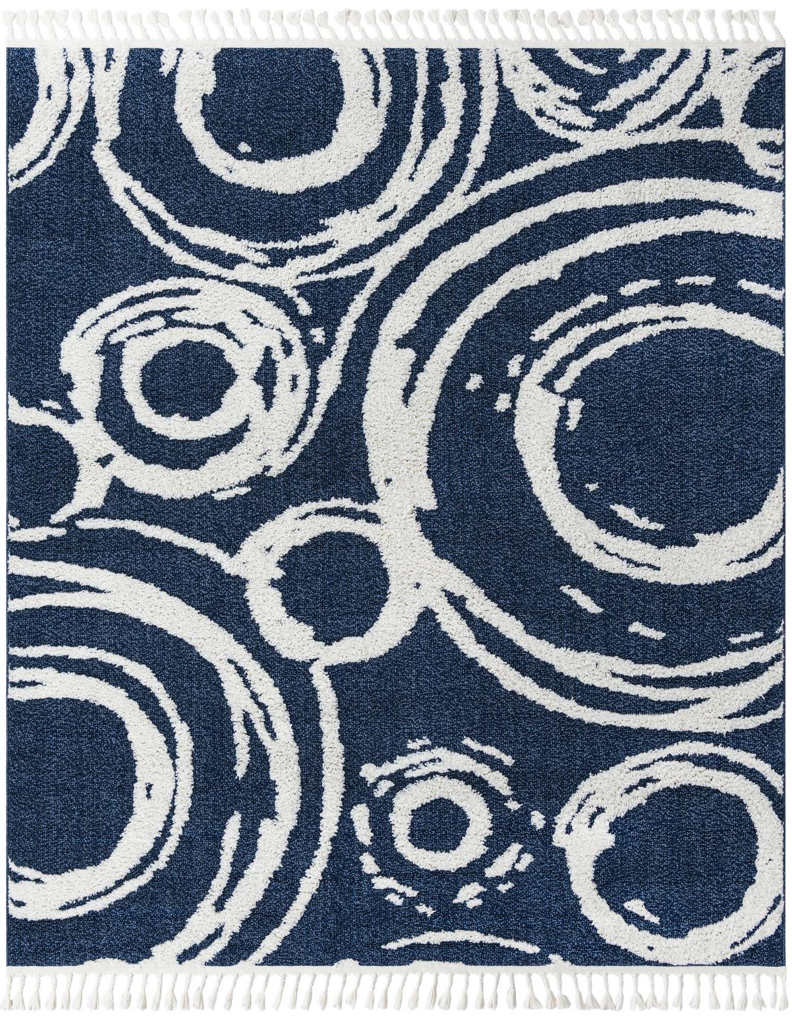 A square blue rug with a modern abstract pattern of white concentric circles and short white fringe.