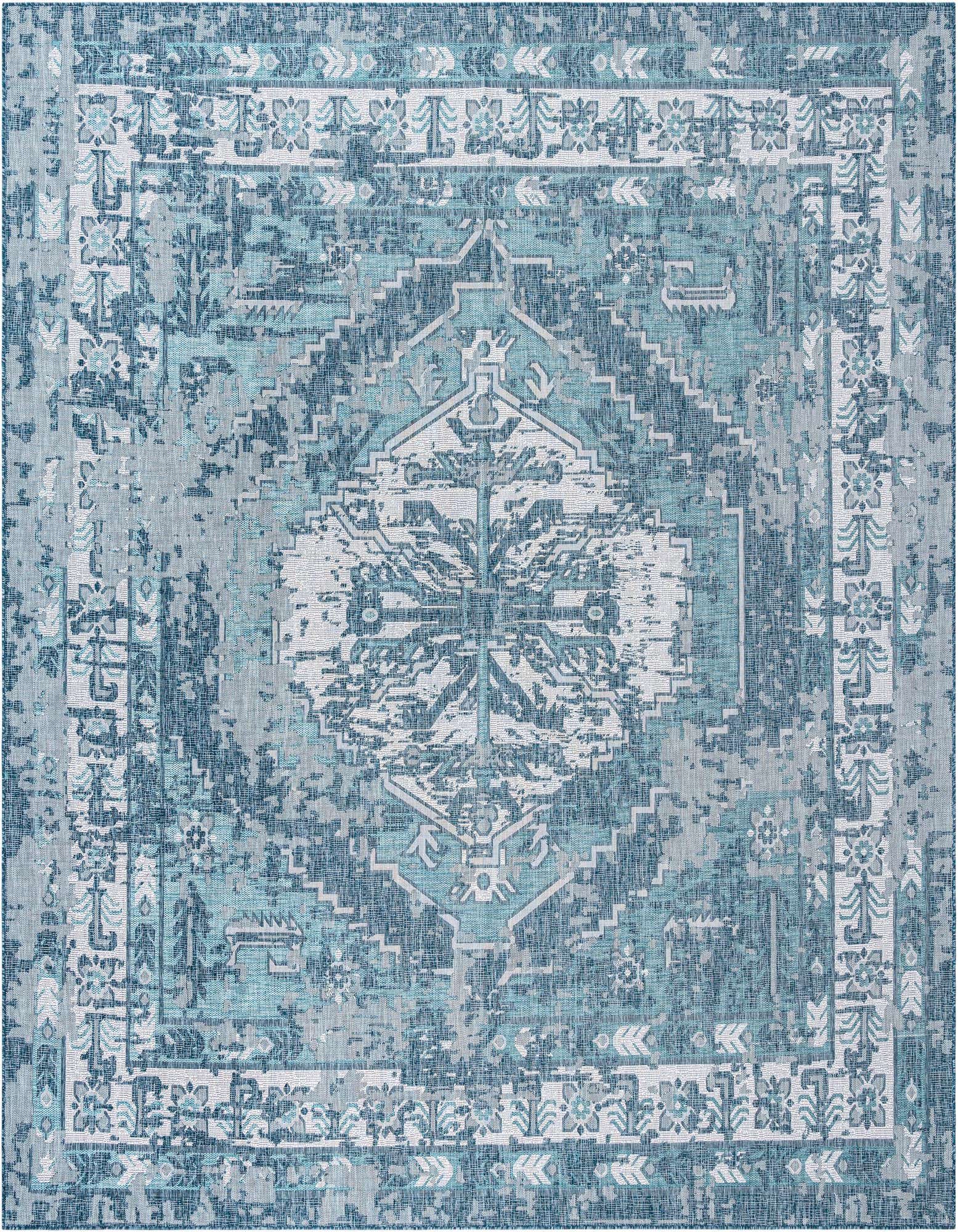 A 13' square blue Southwestern-style outdoor rug with a distressed traditional medallion pattern and border.