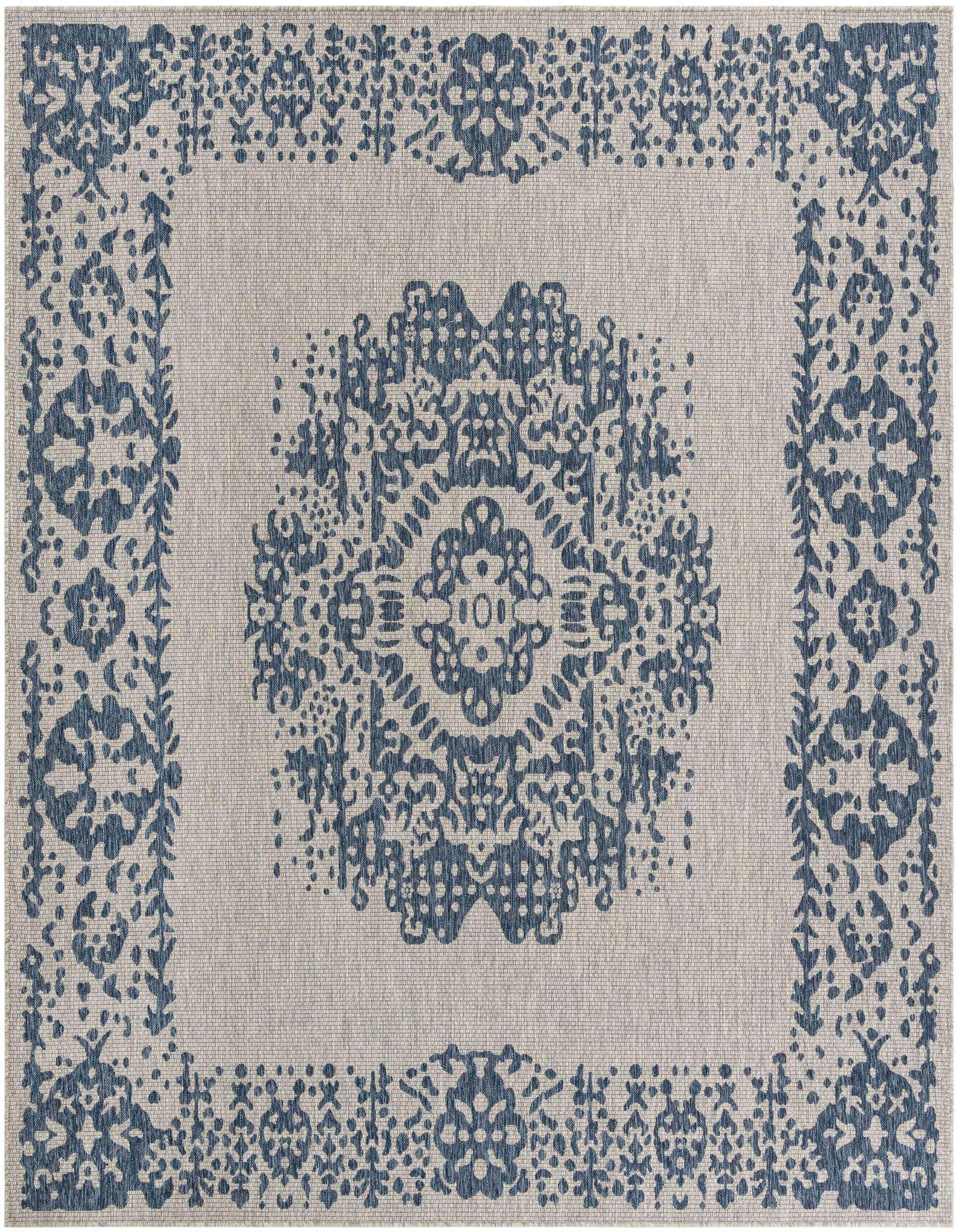 A 10'x10' square blue and beige outdoor rug with a central medallion and ornate border pattern.