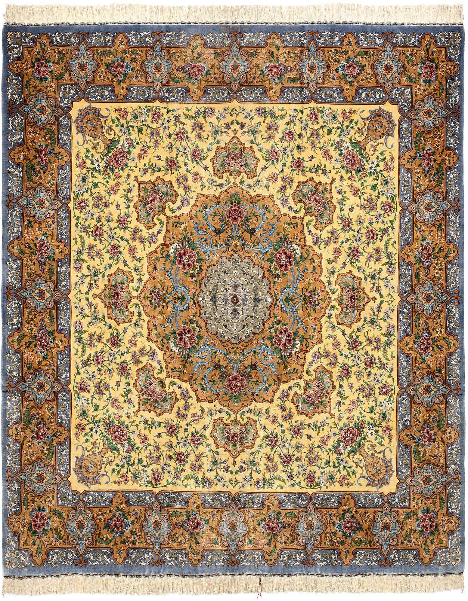 A square 8' 2 x 8' 4 Qom Silk rug featuring a detailed Persian floral medallion design in blues, gold, and cream with a blue border.