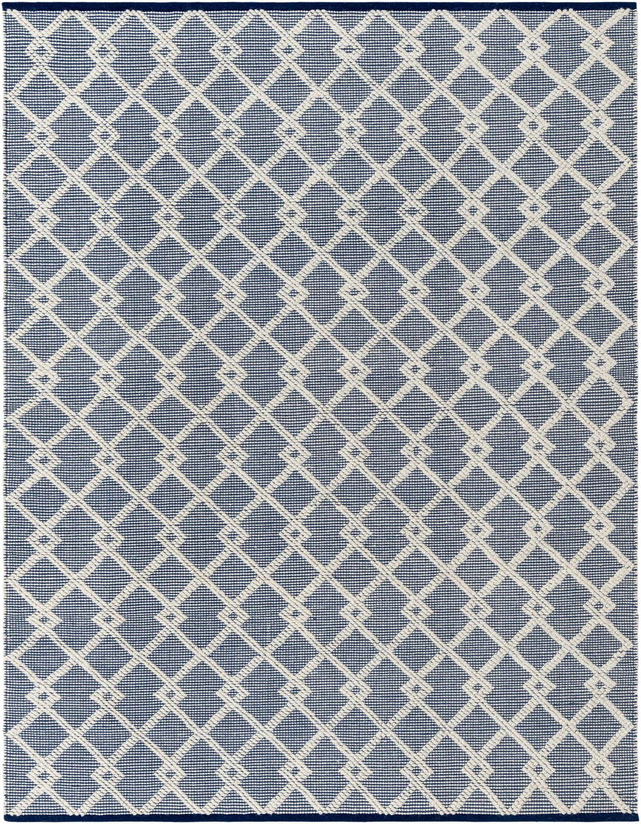 A 6x9 rectangular Rugs.com Jill Zarin Dorset rug featuring a modern blue and white geometric lattice pattern.