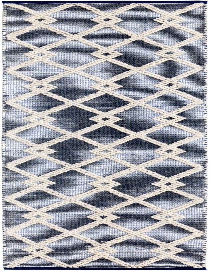 A 6 ft runner rug with a modern abstract pattern in blue and off-white, featuring a textured diamond design.