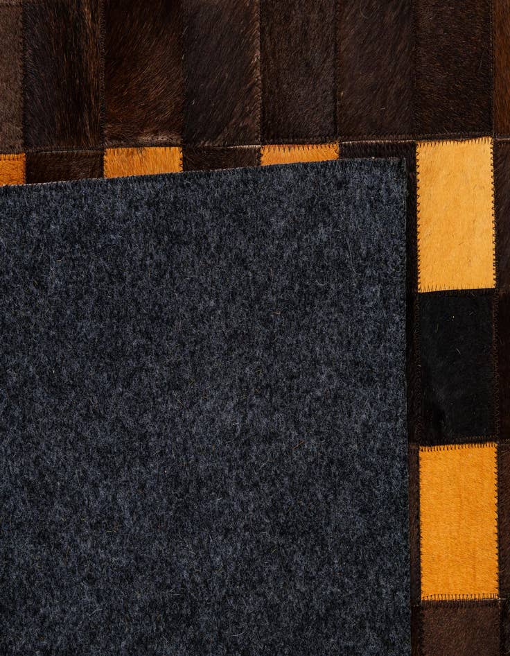 Detail image of  5' 2 x 8' Cowhide - Patchwork Rug