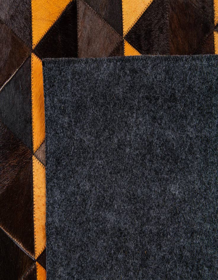Detail image of  5' 1 x 8' Cowhide Stocks Rug