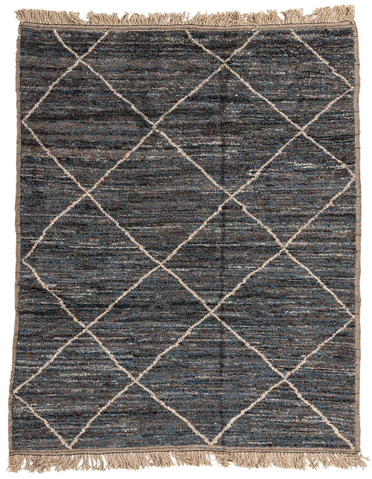 A 6x9 rectangular brown and blue Moroccan shag rug with a white diamond tribal pattern and fringed ends.