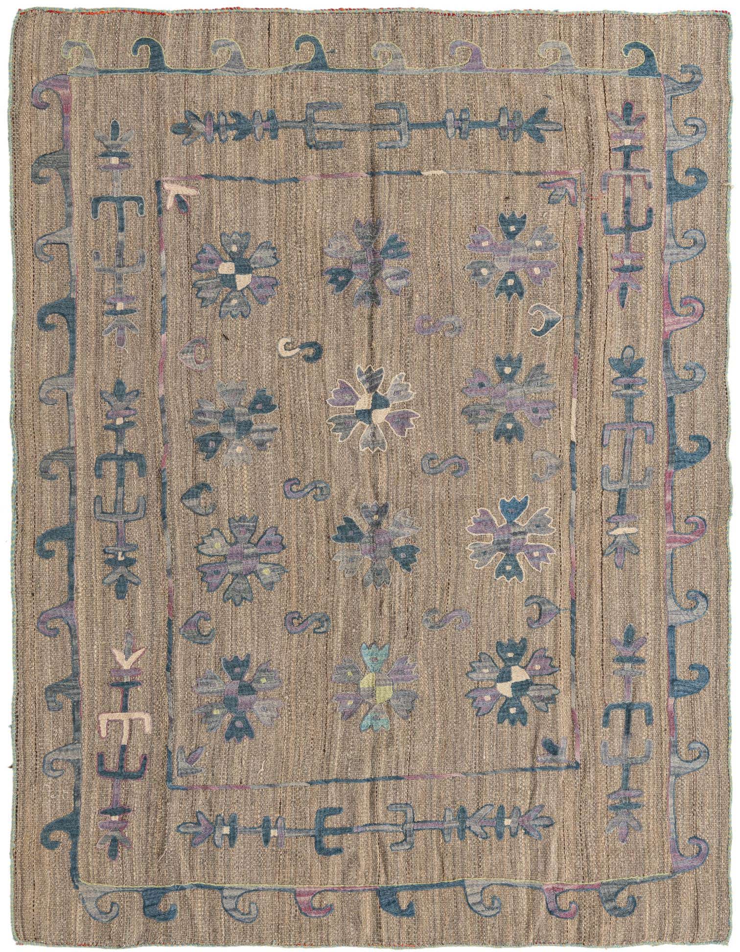 A 5x8 rectangular Kilim Suzani rug featuring a brown and tan flatweave base with tribal floral and geometric patterns in muted blues, purples, and grays.