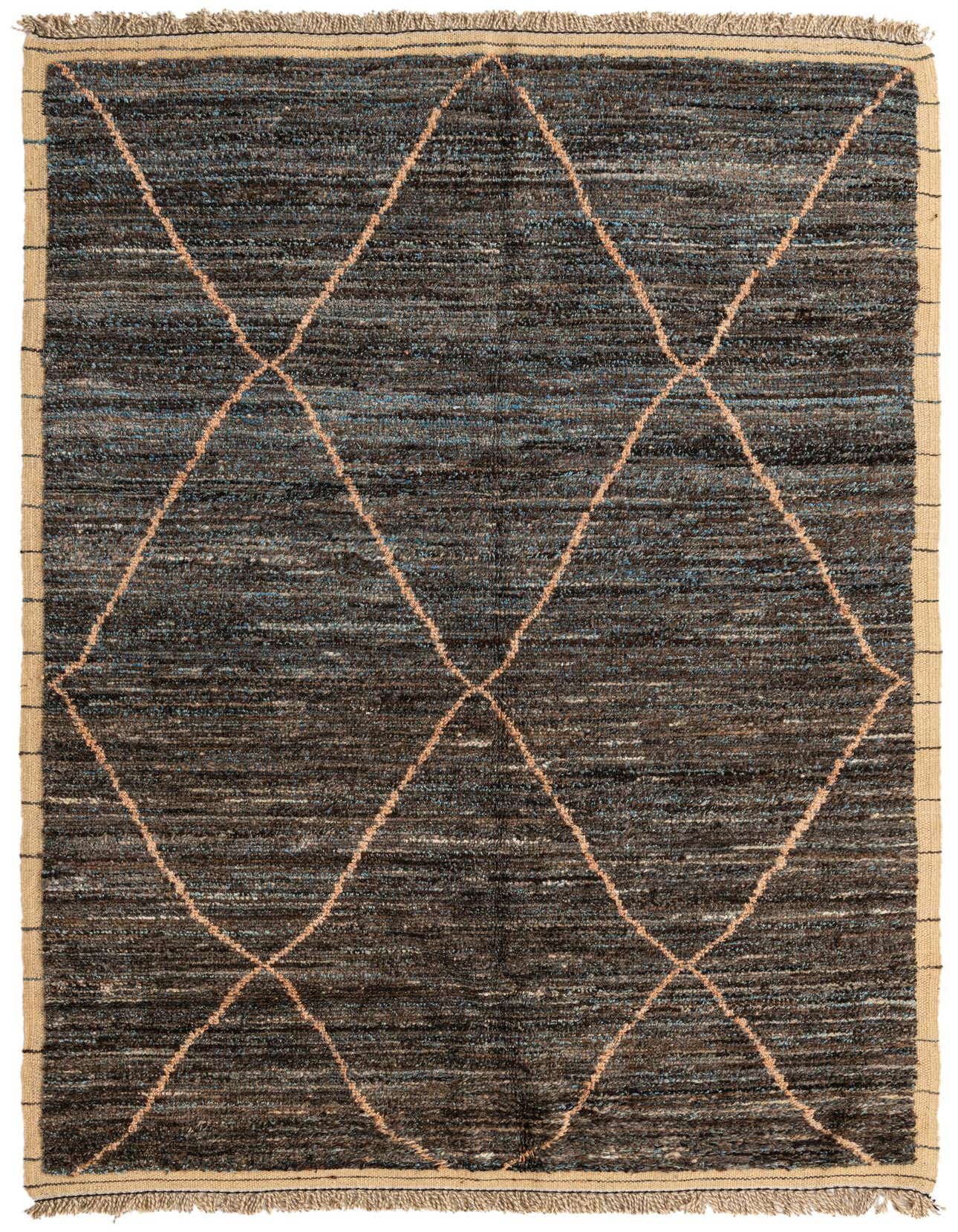 A 6x9 rectangular Moroccan shag rug with a tribal diamond pattern in shades of brown, tan, and gray, featuring fringed edges.