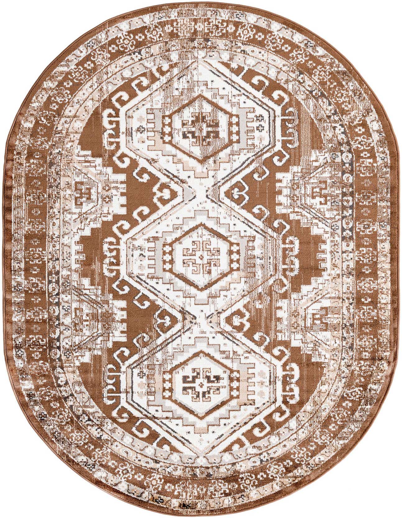 A 5'3" x 8'0" oval Rugs.com Charlotte rug in browns and tans, featuring a traditional tribal Southwestern pattern.