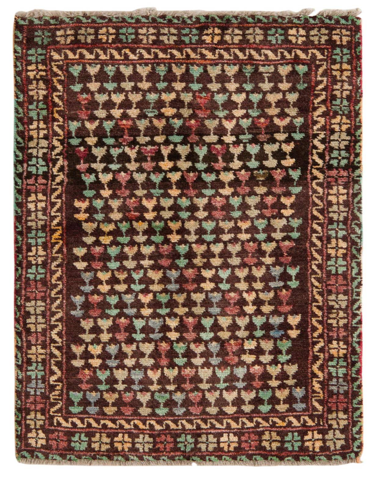 A 3x4 rectangular Balouch rug with a dark brown field featuring colorful tribal motifs and a patterned border.