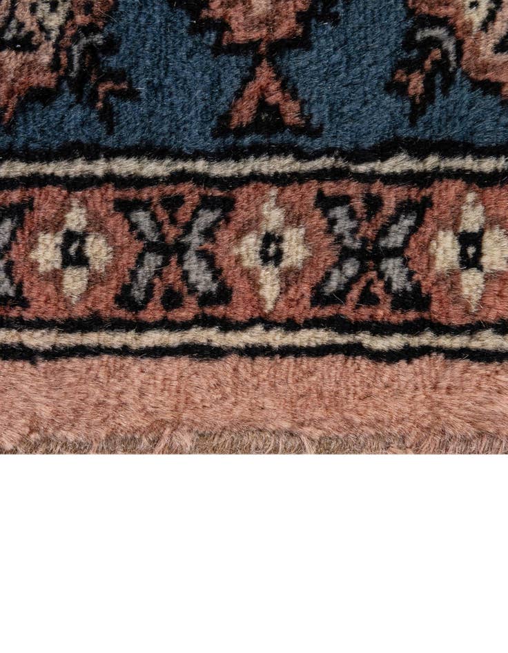 Detail image of  4' 2 x 6' 1  Hand Knotted Bokhara Oriental Wool Rug