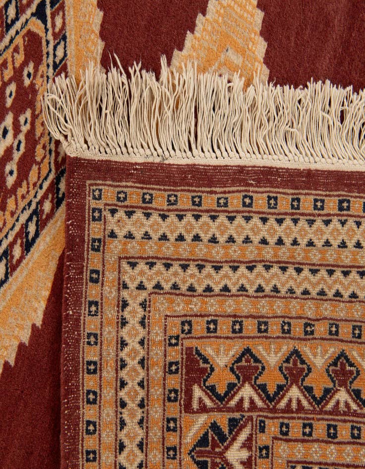Detail image of  4' 3 x 6' 2  Hand Knotted Bokhara Wool Rug
