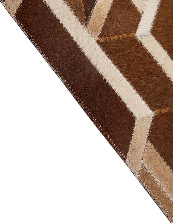 Detail image of  5' 1 x 8' 2 Cowhide - Patchwork Rug