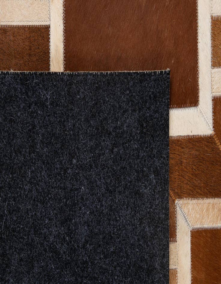 Detail image of  5' 1 x 8' 2 Cowhide - Patchwork Rug