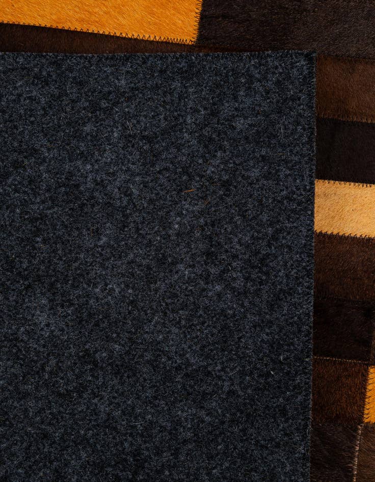 Detail image of  5' x 7' 11 Cowhide - Patchwork Rug