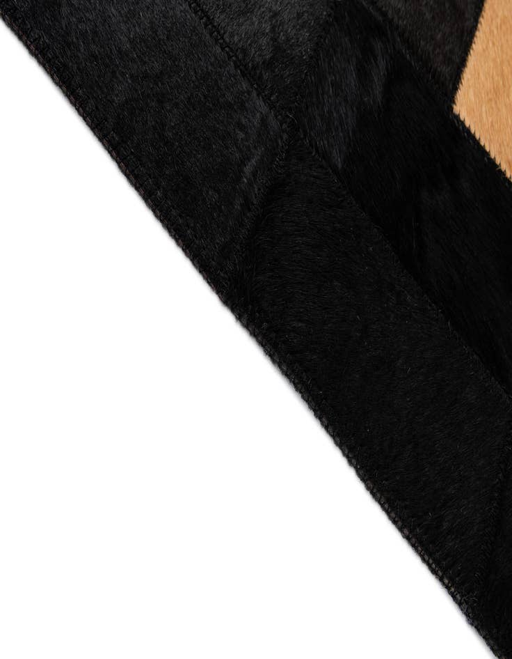 Detail image of  5' x 7' 11 Cowhide - Patchwork Rug