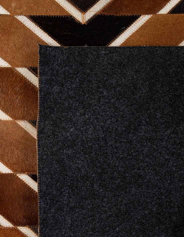 Detail image of  5' 1 x 8' Cowhide - Patchwork Rug