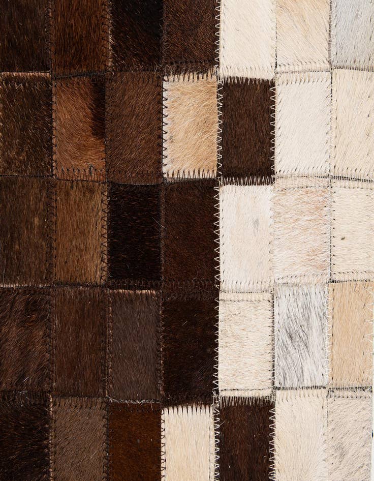 Detail image of  5' 1 x 8' 1 Cowhide - Patchwork Rug