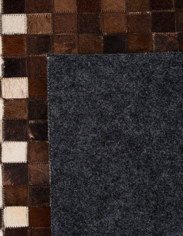 Detail image of  5' 1 x 8' 1 Cowhide - Patchwork Rug