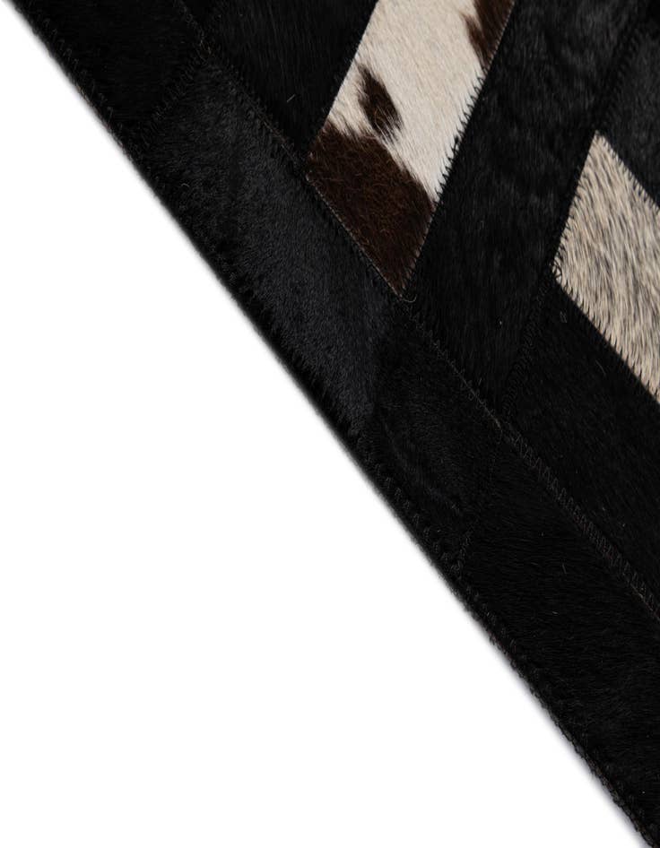 Detail image of  5' 2 x 8' Cowhide - Patchwork Rug