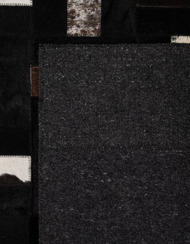 Detail image of  5' 2 x 8' Cowhide - Patchwork Rug