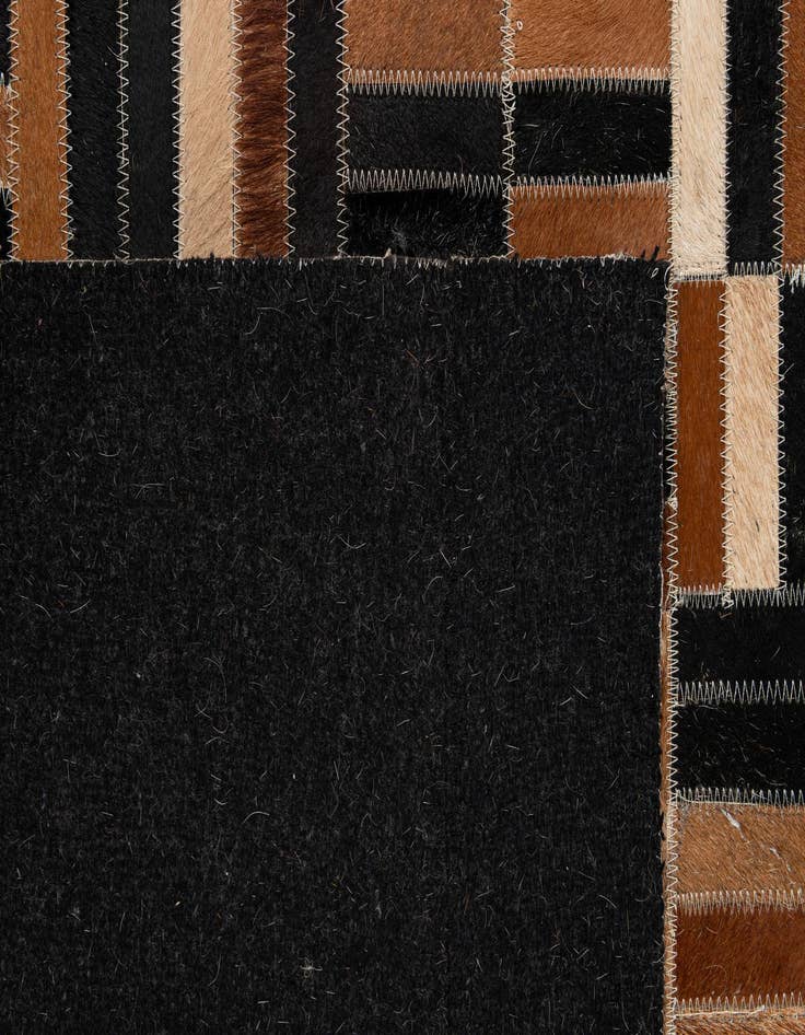 Detail image of  4' 11 x 8' 1 Cowhide - Patchwork Rug
