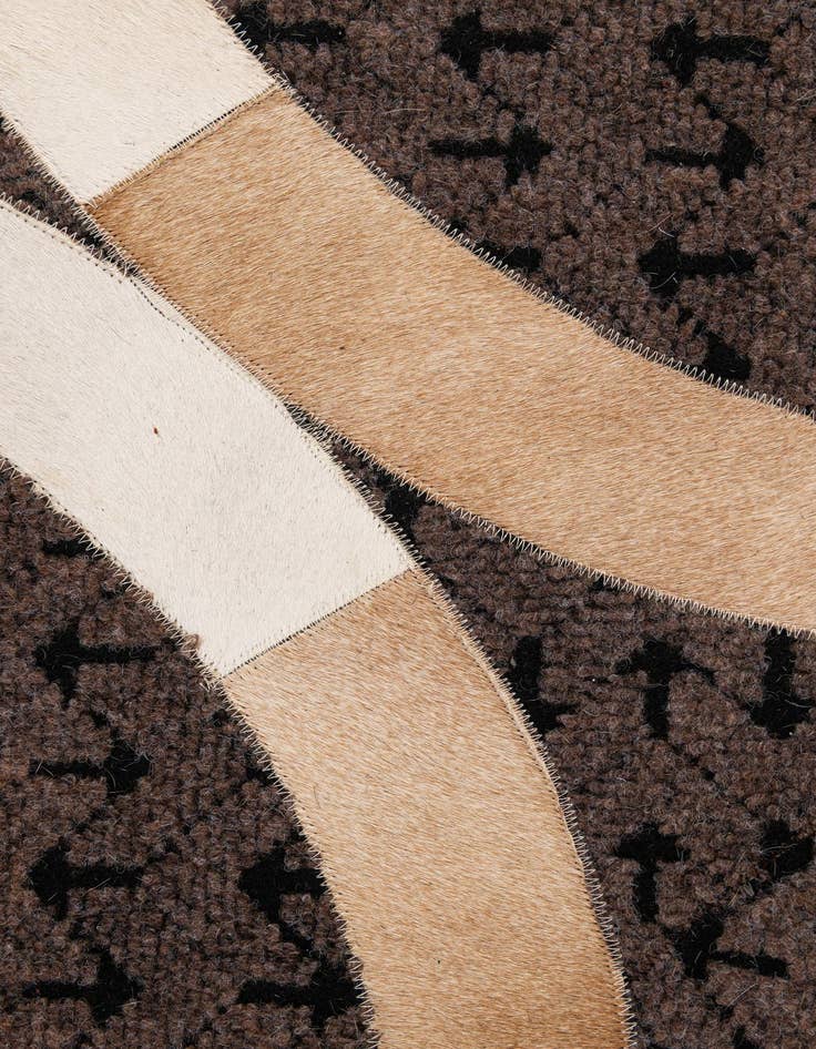 Detail image of  5' 1 x 7' 11 Cowhide - Patchwork Rug