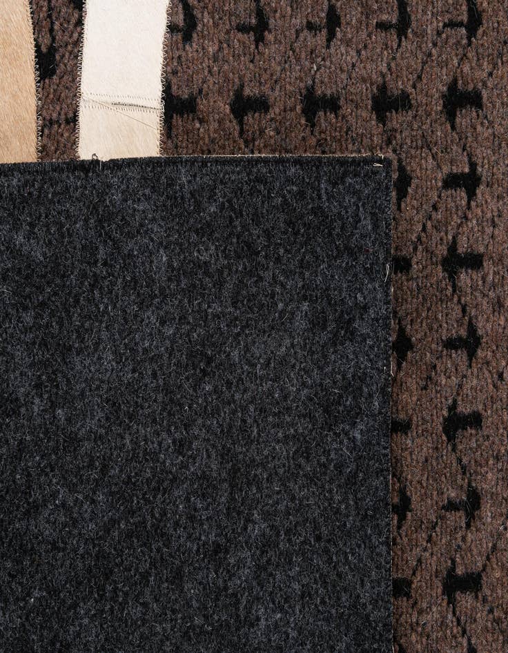 Detail image of  5' 1 x 7' 11 Cowhide - Patchwork Rug
