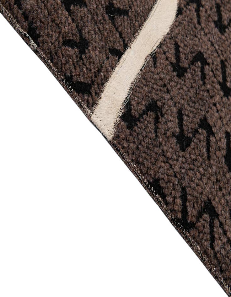 Detail image of  5' 2 x 8' Cowhide - Patchwork Rug