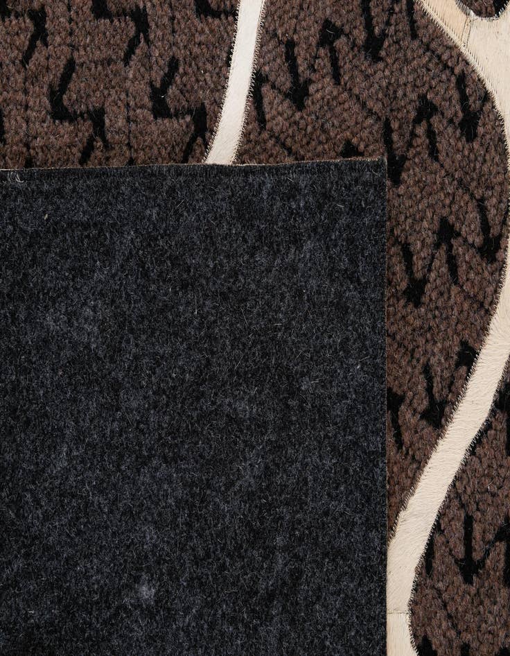 Detail image of  5' 2 x 8' Cowhide - Patchwork Rug