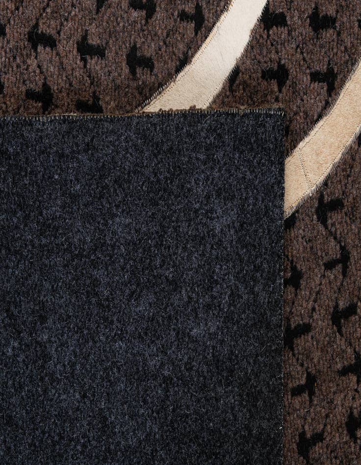 Detail image of  4' 11 x 8' Cowhide - Patchwork Rug
