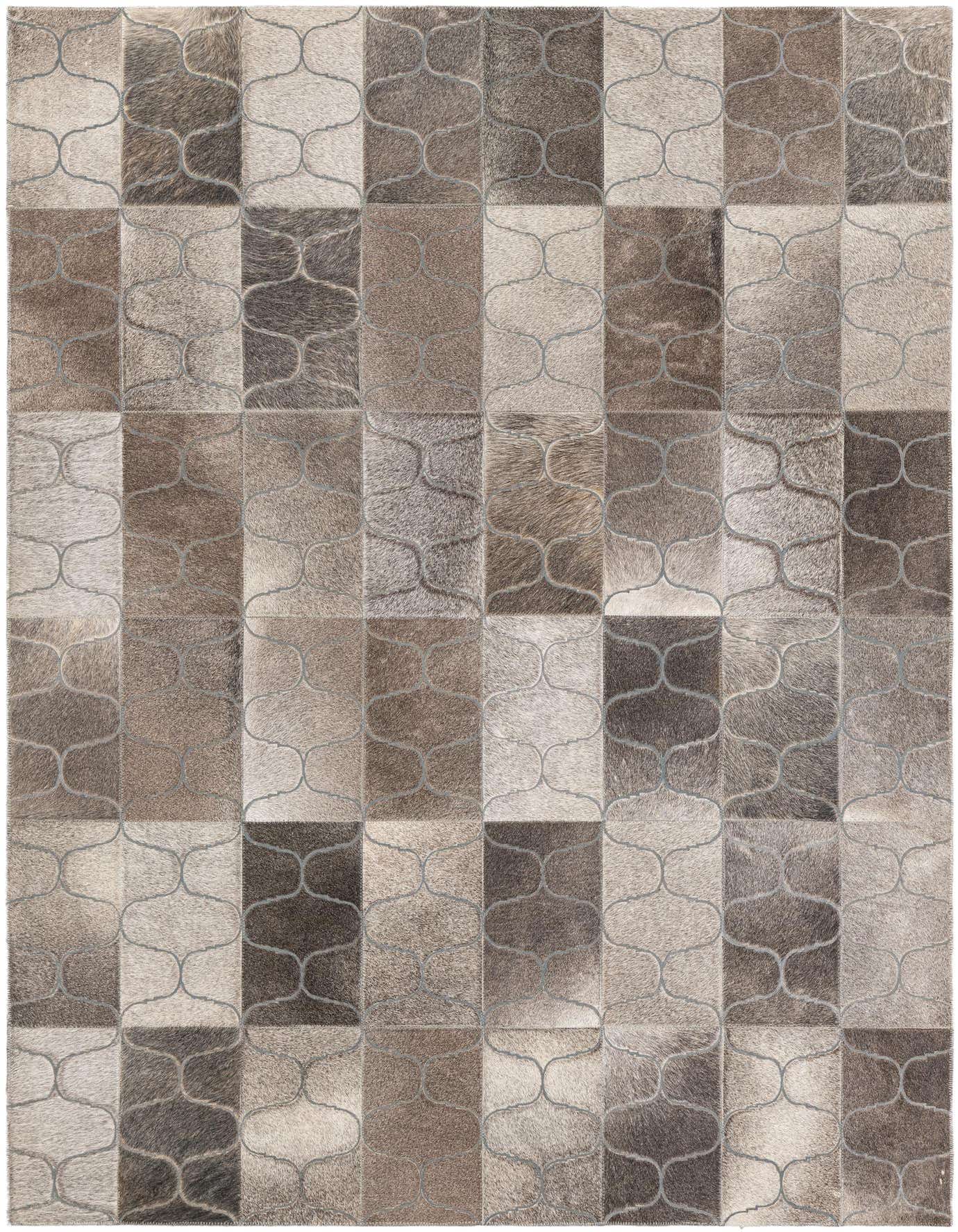 A 4x6 rectangular cowhide rug featuring a modern, abstract patchwork design in varying shades of brown and tan.