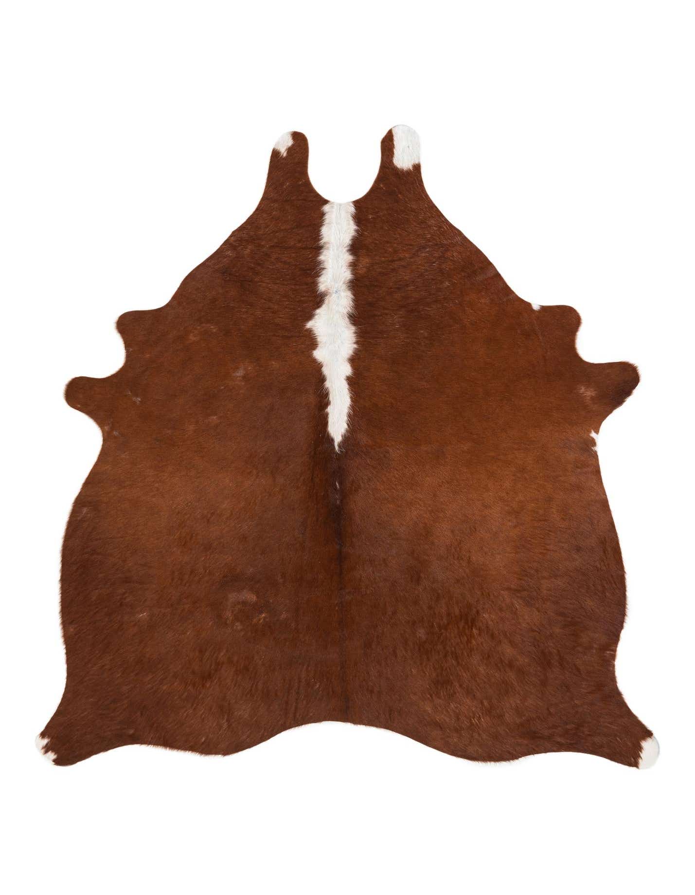 A 5x7 brown and white cowhide rug with a natural, irregular shape and a prominent white stripe down the center.