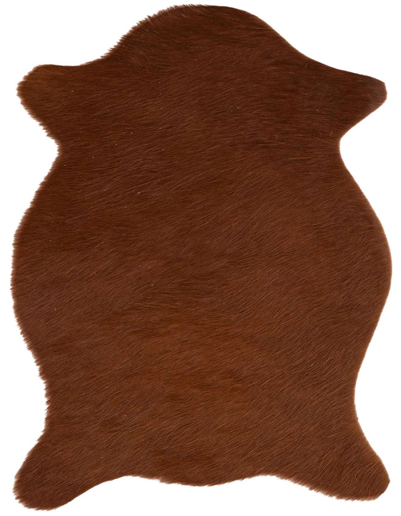 A 2x3 brown cowhide rug with a natural, irregular shape and flat, textured pile, suitable for a modern entryway.