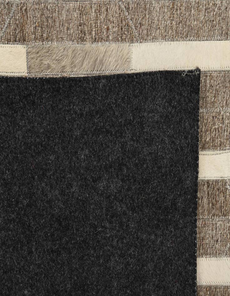 Detail image of  5' 1 x 7' 10 Cowhide Rug