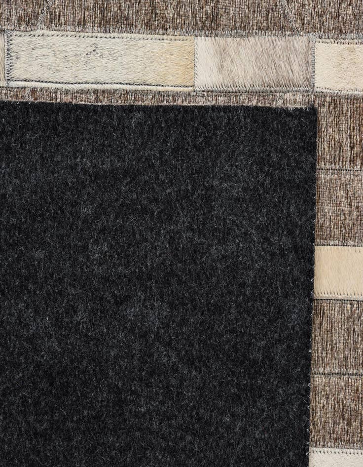 Detail image of  5' 1 x 7' 10 Cowhide Rug