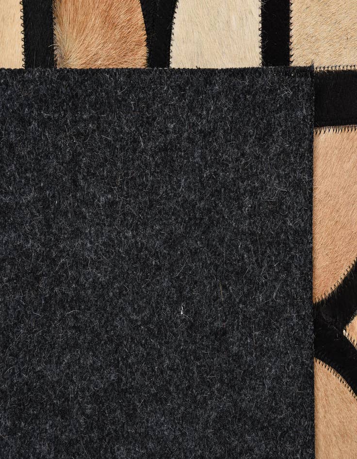 Detail image of  5' x 7' 9 Cowhide Rug