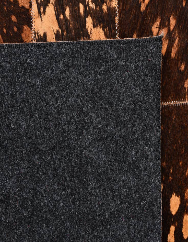 Detail image of  4' 10 x 7' 9 Cowhide Rug