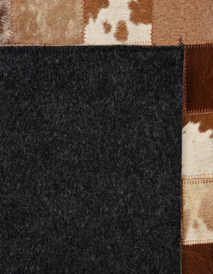 Detail image of  5' 3 x 7' 10 Cowhide Rug