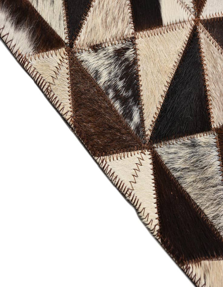 Detail image of  5' 4 x 7' 7 Cowhide Rug