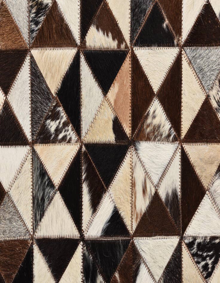 Detail image of  5' 4 x 7' 7 Cowhide Rug