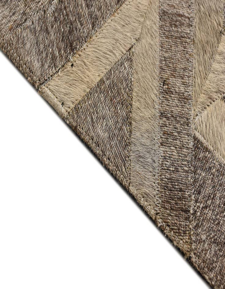 Detail image of  5' 1 x 7' 10 Cowhide Rug