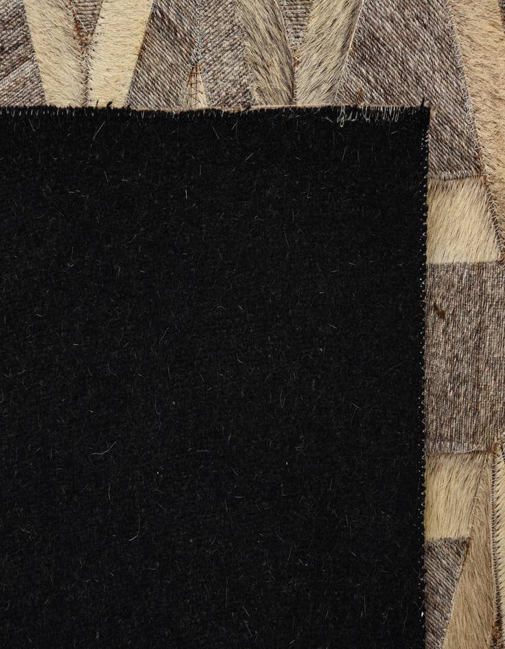 Detail image of  5' 1 x 7' 10 Cowhide Rug